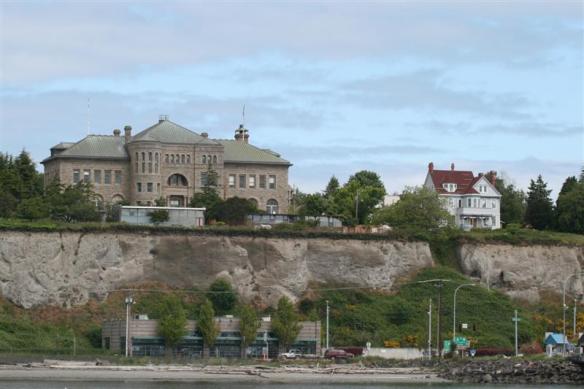 Above the cliffs, the post office and one of the Victorian homes.