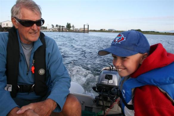 Charlie and his Opa in the dinghy.