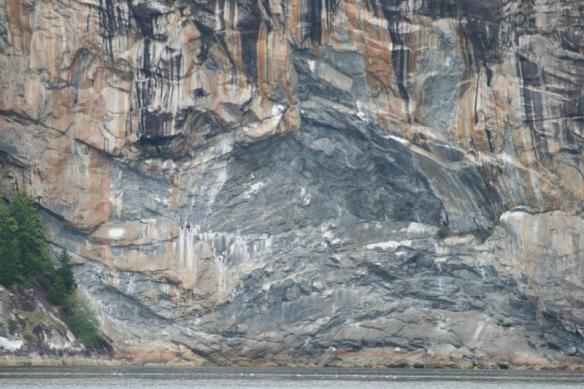 Rock wall, at the entrance to Simoom Sound.