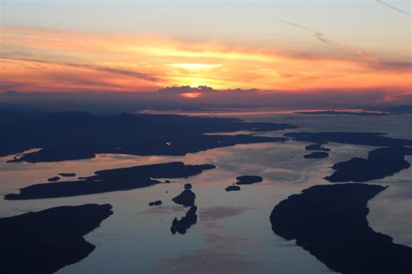 Sunset over the Gulf islands, Clam bay, Porlier pass, in the distance, Dodd narrows.