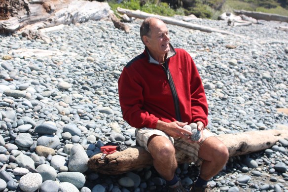Roel collecting rocks for the bocce game.