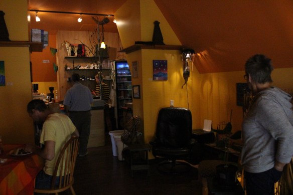 the inside of the caffe has a warm ambience, paited in warm colors.