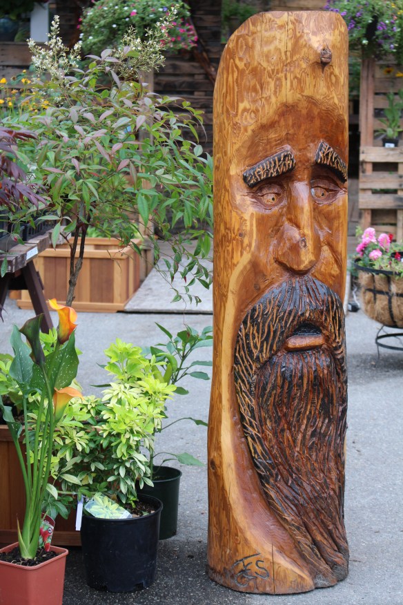 Lots of beautiful plants for sale at the garden center, but also this stern looking fellow!