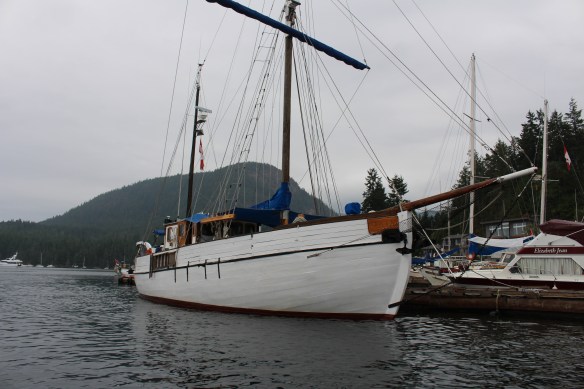 SV GAIA at the dock on a very dark and rainy day.