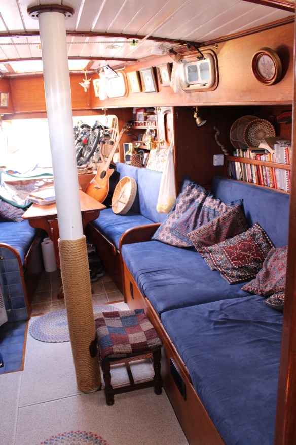 Curtsy inside, bookshelf behind the seating.