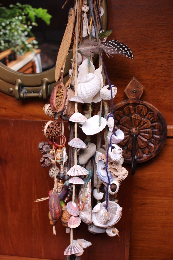 hanging art on the boat and about growing vegies 005